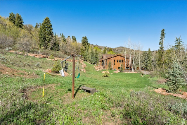 3321 W Big Spruce Way Unit E54, Park City, UT 84098 - view of green lawn featuring a wooded view