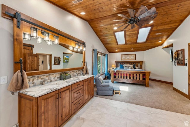 3321 W Big Spruce Way Unit E54, Park City, UT 84098 - bathroom with wooden ceiling, double vanity, lofted ceiling, ensuite bath, and a skylight