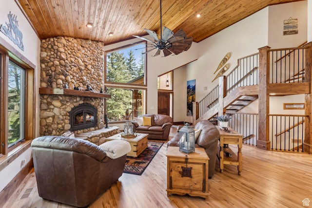 3321 W Big Spruce Way Unit E54, Park City, UT 84098 - living area with wooden ceiling, wood finished floors, ceiling fan, a fireplace, and stairs