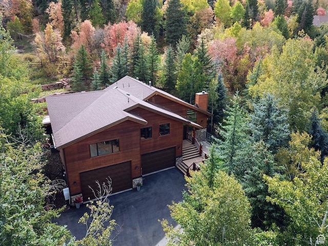 3321 W Big Spruce Way Unit E54, Park City, UT 84098 - aerial view of property and surrounding area featuring a heavily wooded area