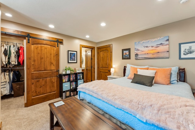 3321 W Big Spruce Way Unit E54, Park City, UT 84098 - carpeted bedroom with a spacious closet, recessed lighting, a barn door, and a closet