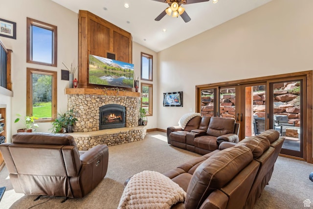 3321 W Big Spruce Way Unit E54, Park City, UT 84098 - carpeted living area featuring a fireplace, high vaulted ceiling, a ceiling fan, baseboards, and recessed lighting