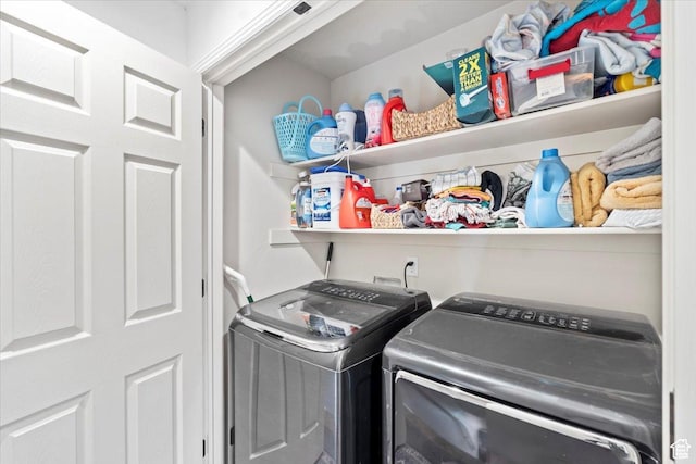 laundry room featuring independent washer and dryer