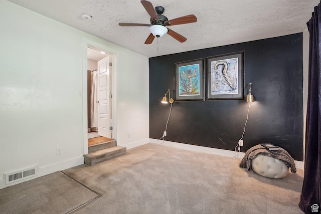 2597 S Elizabeth St, Salt Lake City, UT 84106 - empty room with carpet floors, a ceiling fan, baseboards, and a textured ceiling