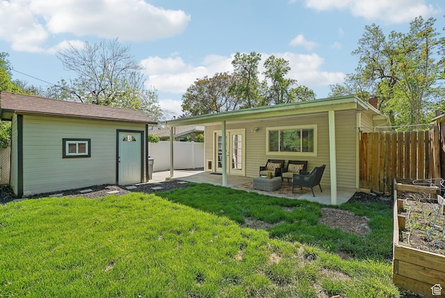 2597 S Elizabeth St, Salt Lake City, UT 84106 - back of house with an outdoor structure, a patio area, and an outdoor living space