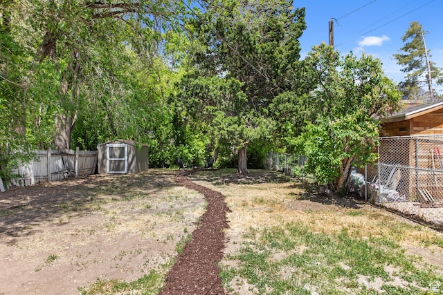 63 E 100 S, Nephi, UT 84648 - fenced backyard with a storage unit and an outbuilding