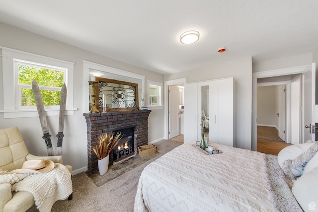 63 E 100 S, Nephi, UT 84648 - carpeted bedroom with a fireplace and baseboards