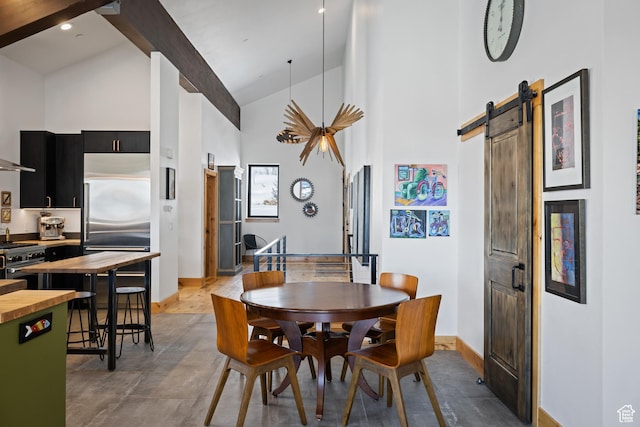 10256 N Basin Canyon Rd, Park City, UT 84098 - dining room featuring high vaulted ceiling, baseboards, a barn door, and beamed ceiling