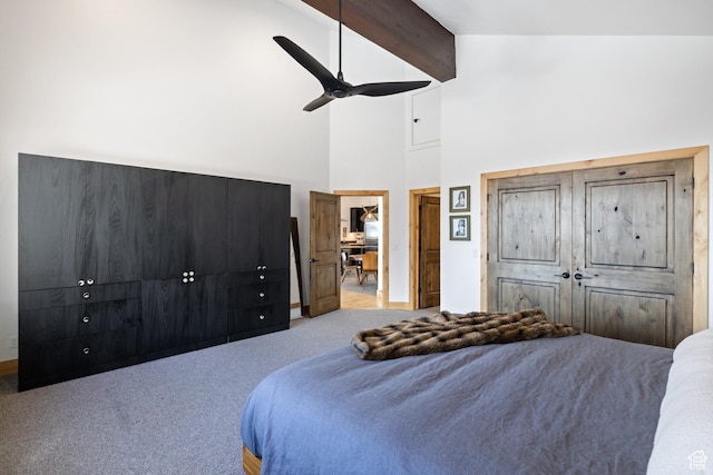 10256 N Basin Canyon Rd, Park City, UT 84098 - carpeted bedroom with a high ceiling, beam ceiling, a ceiling fan, a closet, and baseboards