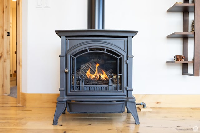 10256 N Basin Canyon Rd, Park City, UT 84098 - detailed view of a wood stove and wood finished floors
