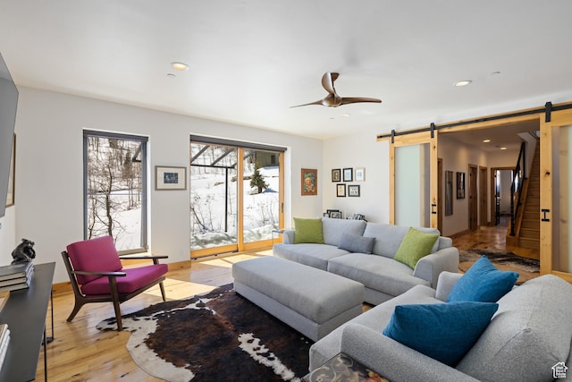 10256 N Basin Canyon Rd, Park City, UT 84098 - living area with a barn door, light wood finished floors, recessed lighting, and a ceiling fan