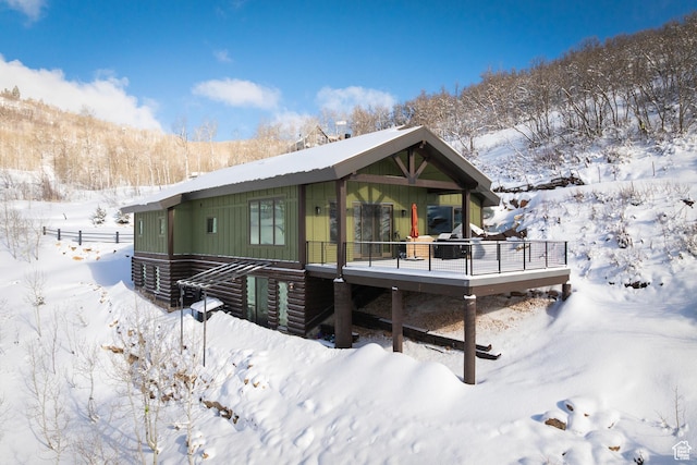 10256 N Basin Canyon Rd, Park City, UT 84098 - snow covered property with a wooden deck