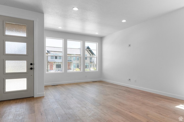2415 N Ribe Ln, Lehi, UT 84043 - foyer entrance featuring light wood-style flooring, baseboards, and recessed lighting