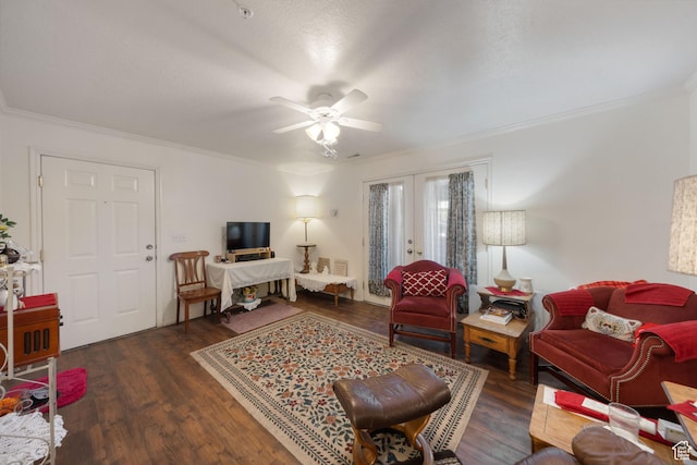 living area featuring ornamental molding, ceiling fan, french doors, and wood finished floors