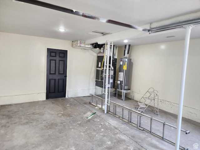 below grade area featuring water heater