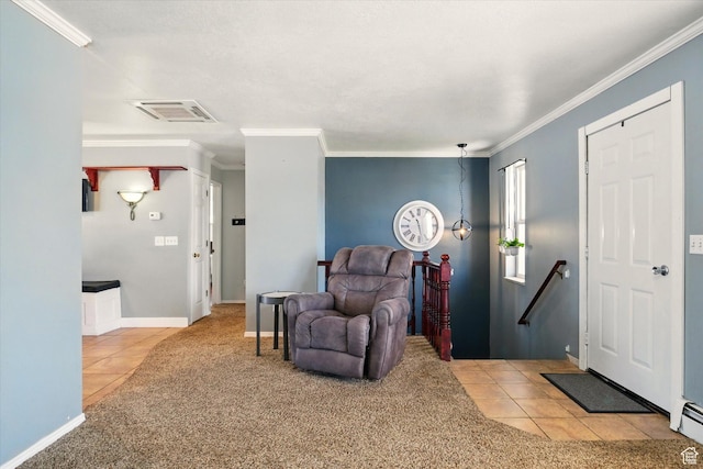 carpeted foyer with ornamental molding, tile patterned flooring, and baseboards