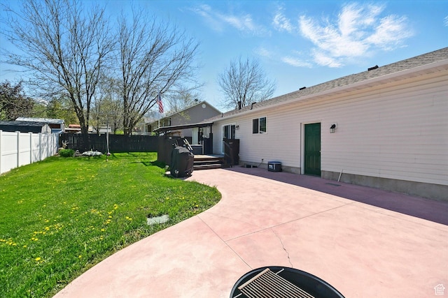 view of yard with a patio area and a deck