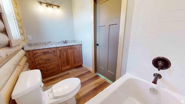 1982 S High Juniper Dr, Cedar City, UT 84720 - full bathroom featuring toilet, wood finished floors, and vanity