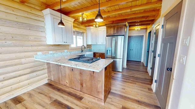 1982 S High Juniper Dr, Cedar City, UT 84720 - kitchen featuring stainless steel fridge, wooden ceiling, gas cooktop, light wood-type flooring, and light stone counters
