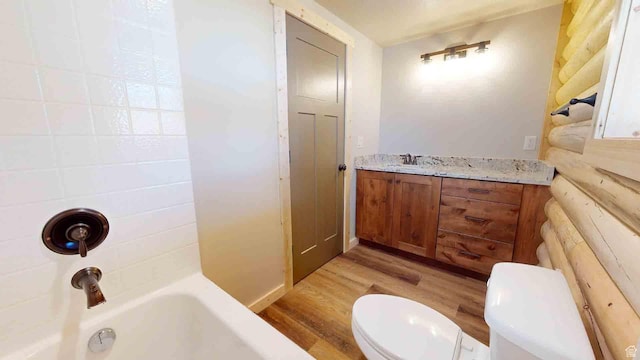 1982 S High Juniper Dr, Cedar City, UT 84720 - full bath featuring wood finished floors, toilet, vanity, and washtub / shower combination