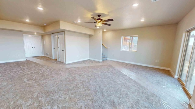 1982 S High Juniper Dr, Cedar City, UT 84720 - spare room with recessed lighting, stairs, a ceiling fan, baseboards, and light carpet