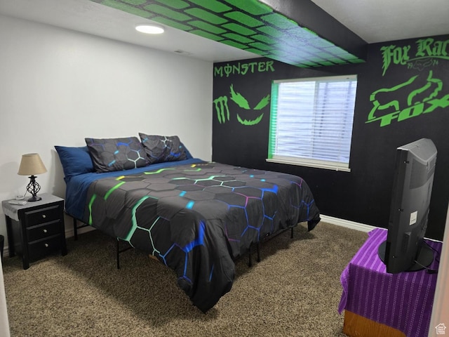 bedroom with carpet and baseboards