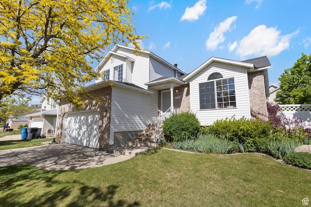 4962 S Glasmann Way S, Ogden, UT 84403 - view of front of property with brick siding and an attached garage