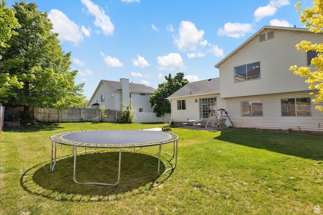 4962 S Glasmann Way S, Ogden, UT 84403 - back of property with a trampoline