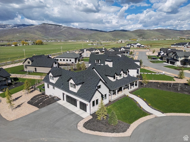 aerial view of residential area with a mountain backdrop