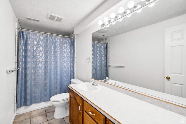 860 S 720 W, Glenwood, UT 84730 - full bathroom with a textured ceiling, toilet, vanity, tile patterned flooring, and shower / tub combo with curtain