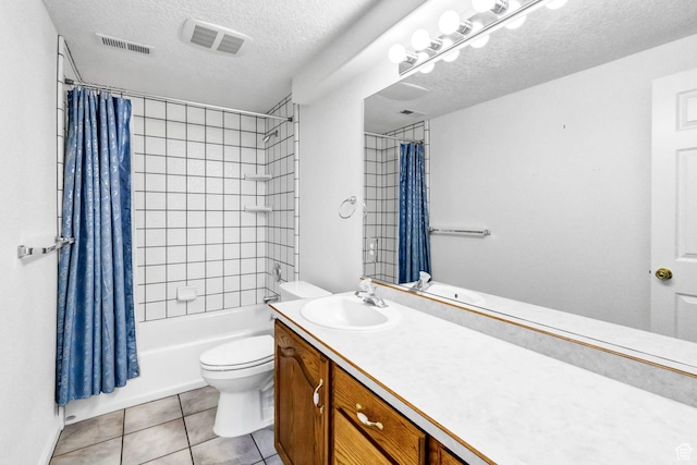 860 S 720 W, Glenwood, UT 84730 - full bathroom with a textured ceiling, toilet, vanity, shower / bath combo, and tile patterned floors