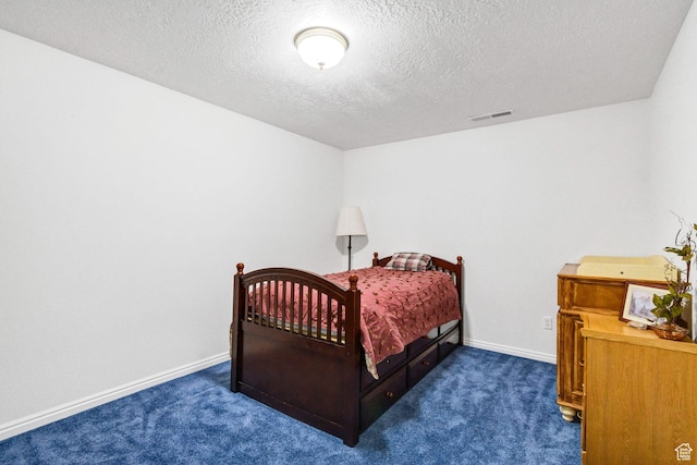 860 S 720 W, Glenwood, UT 84730 - carpeted bedroom featuring a textured ceiling and baseboards