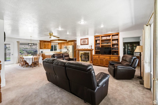 860 S 720 W, Glenwood, UT 84730 - living area with light carpet, ceiling fan, and recessed lighting
