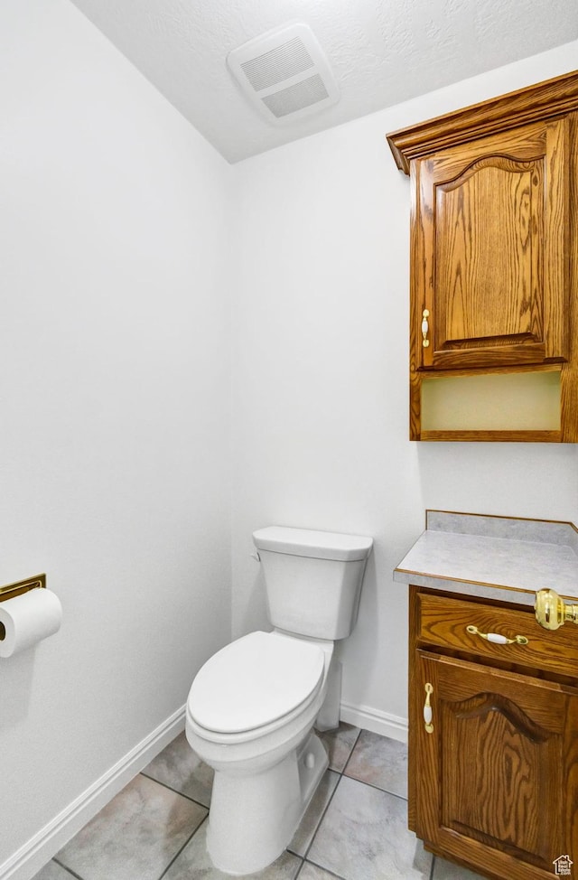 860 S 720 W, Glenwood, UT 84730 - half bath featuring baseboards, toilet, and tile patterned flooring