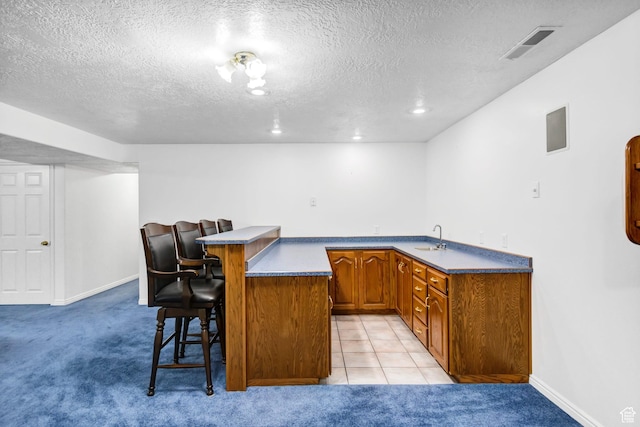 860 S 720 W, Glenwood, UT 84730 - indoor bar with a textured ceiling, light carpet, baseboards, and recessed lighting