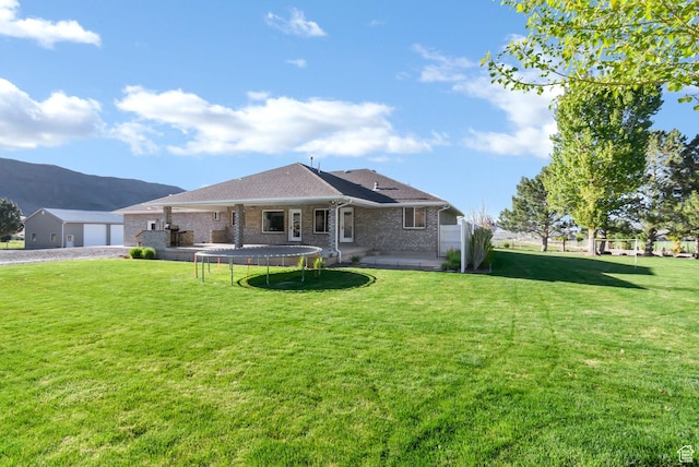 860 S 720 W, Glenwood, UT 84730 - rear view of property with a yard, brick siding, a mountain view, and gravel driveway