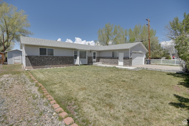 ranch-style house with an attached garage, brick siding, and driveway