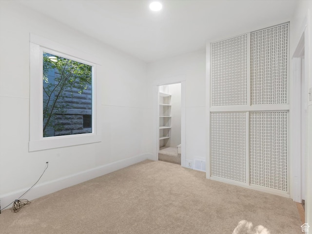 331 N K St, Salt Lake City, UT 84103 - carpeted spare room with baseboards and recessed lighting