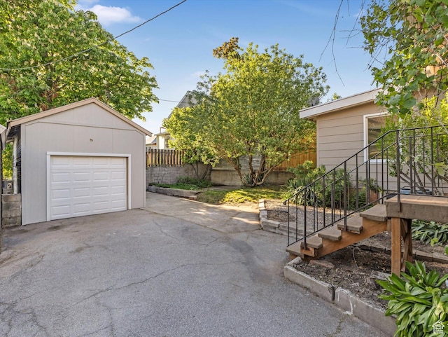 331 N K St, Salt Lake City, UT 84103 - detached garage featuring driveway and fence