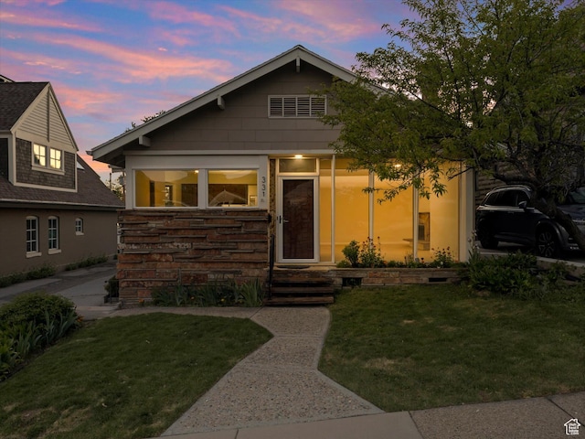 331 N K St, Salt Lake City, UT 84103 - view of front facade with a front lawn