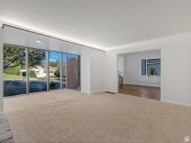 331 N K St, Salt Lake City, UT 84103 - carpeted empty room with baseboards