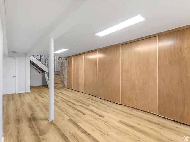 331 N K St, Salt Lake City, UT 84103 - additional living space with light wood-type flooring and stairway