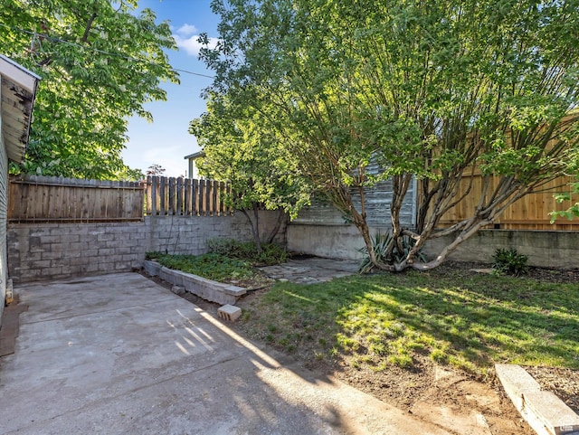 331 N K St, Salt Lake City, UT 84103 - fenced backyard with a patio area
