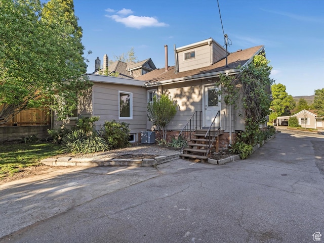 331 N K St, Salt Lake City, UT 84103 - view of front of home featuring entry steps and central AC