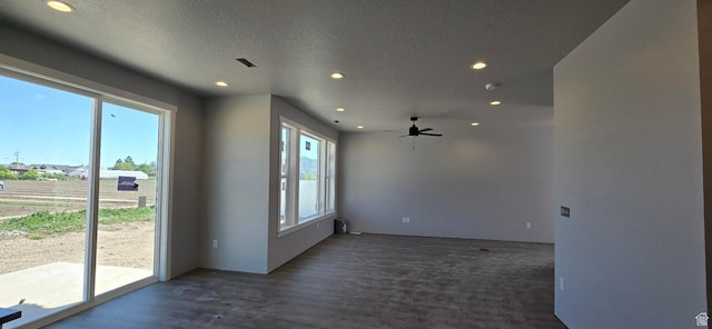 208 W 1300 S, Tremonton, UT 84337 - unfurnished room with recessed lighting, plenty of natural light, a ceiling fan, a textured ceiling, and wood finished floors