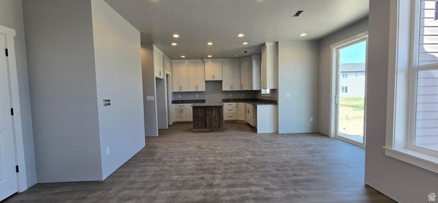 208 W 1300 S, Tremonton, UT 84337 - kitchen with recessed lighting, dark wood-style floors, white cabinets, dark countertops, and open floor plan