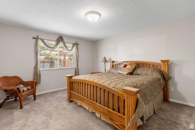 1660 E 900 S Unit 29, Clearfield, UT 84015 - bedroom featuring light carpet, baseboards, and a textured ceiling
