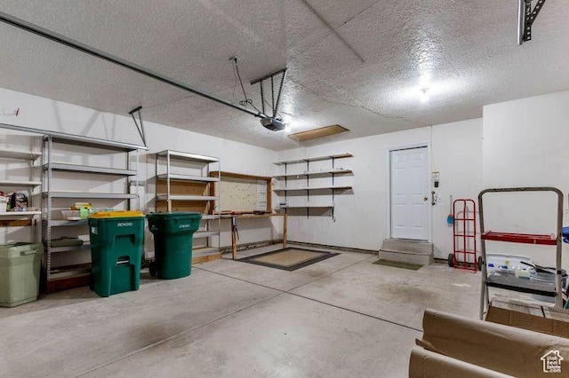 1660 E 900 S Unit 29, Clearfield, UT 84015 - garage featuring a garage door opener