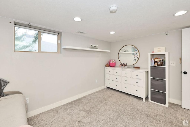 bedroom with light carpet, baseboards, and recessed lighting