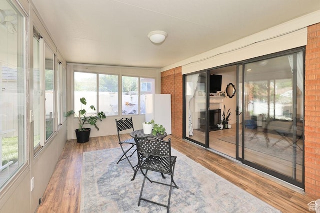 sunroom with wood finished floors